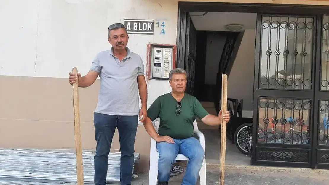 Bir haftada 8 yangın çıkınca, apartman sakinleri sopayla nöbete başladı