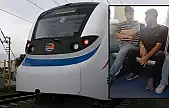 İZBAN'da skandal görüntü: Sigara içip külünü yere attı